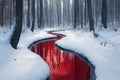 Surreal red river flowing through a snow covered forest in winter Royalty Free Stock Photo