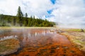 Surreal scene of Firehole Lake and steam in Yellowstone National Park Royalty Free Stock Photo