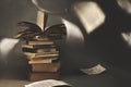 Surreal stack of vintage books where the pages flutter free Royalty Free Stock Photo