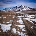 Surreal winter landscapes and snow capped mountain scenery in the SIloli Desert, Sud Lipez province, Bolivia