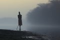 Surrealism and mysticism invisible figure in the fog on the lake shore Royalty Free Stock Photo