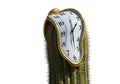 A surrealist composition featuring a melting, distorted clock with a gold frame draped over a tall, Royalty Free Stock Photo