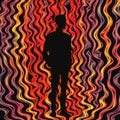 Surrealistic Distortion: A Colorful Swirl Pattern With A Silhouette Of A Man