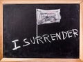 Surrender word on blackboard