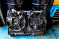 Surrey, BC / Canada - 02/24/2020: Automotive car cooling system taken apart at a mechanic shop, with two fans showing, for Hyundai