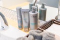 Surrey, BC / Canada - 07/16/19: SkinMedica Facial Cleanser, Sensitive Skin Cleanser and Rejuvenate Toner on bathroom sink. High en