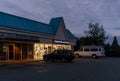 SURREY, CANADA - SEPTEMBER 23, 2019: Group of strip mall stores with cars in front. Royalty Free Stock Photo