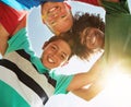 Surrounded by the best mates ever. Portrait of a group of diverse and happy kids huddled together on a bright day Royalty Free Stock Photo