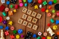 `Zero Sum Game` spelled out in wooden letter tiles