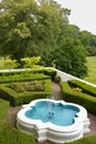 Sculpted gardens and patio with Moorish Geometric Fountain Royalty Free Stock Photo