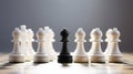 Surrounded by white pawns, the black pawn exemplifies the concept of standing out for selection Royalty Free Stock Photo