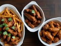 top down photo of carne asada fries and buffalo chicklen wings Royalty Free Stock Photo