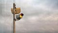 Surveillance camera on exterior pole with computer circuits