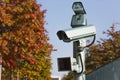 Surveillance camera with motion sensor. Royalty Free Stock Photo