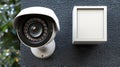 Surveillance camera mounted on a textured wall Royalty Free Stock Photo