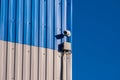 Surveillance camera on  wall Royalty Free Stock Photo