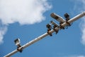 surveillance cameras and radars on a metal pole above the road