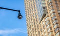 Surveillance CCTV Security Camera in the city, blue sky background Royalty Free Stock Photo