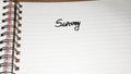 Survey, handwriting text on page of office agenda, office spiral notebook. Copy space