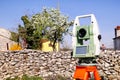 Survey Instrument geodetic device, total station set in the field