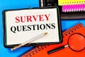 Survey questions. Text label in the task planning notepad. Royalty Free Stock Photo