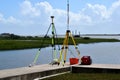 Surveying equipment by river in St Augustine Royalty Free Stock Photo