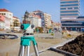 Surveying equipment to infrastructure construction project Royalty Free Stock Photo