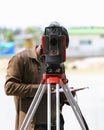 Surveying measuring equipment level theodolite on tripod at cons Royalty Free Stock Photo