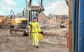 Surveyor builder site engineer with theodolite total station at construction site outdoors during surveying work Royalty Free Stock Photo