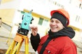 Surveyor at construction site