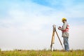 Surveyor engineer making measure Royalty Free Stock Photo