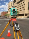 Surveyor engineer's equipment for measuring level on construction site.