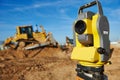 Surveyor equipment at construction site Royalty Free Stock Photo