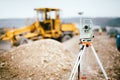 Surveyor equipment GPS system or theodolite outdoors at highway construction site. Surveyor engineering with total station Royalty Free Stock Photo