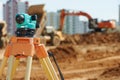 Surveyor equipment level outdoors at construction site