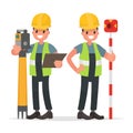 Surveyor and his assistant to work with the equipment Royalty Free Stock Photo