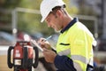 Surveyor making notes on site Royalty Free Stock Photo