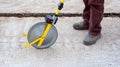 Surveyor with measuring wheel (odometer) Royalty Free Stock Photo