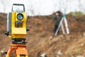 Surveyor theodolite on tripod Royalty Free Stock Photo