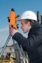 Surveyor with transit level Royalty Free Stock Photo