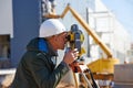 Surveyor worker with theodolite Royalty Free Stock Photo