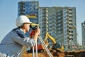 Surveyor worker with theodolite Royalty Free Stock Photo