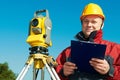 Surveyor worker with theodolite Royalty Free Stock Photo