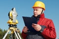 Surveyor worker with theodolite