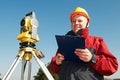 Surveyor worker with theodolite Royalty Free Stock Photo