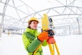 Surveyor works with theodolite