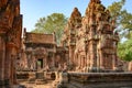 Temple Banteay Srei, Cambodia. Ruins of Hindu Temple Banteay Srei near Angkor Wat. Monkey guards in front of temple entrance