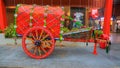 Old traditionally decorated bullock cart in display in front of the store during pongal