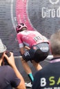 Susa, Italy, May 26, 2018 - Four-time Tour de France winner Chris Froome in the pink jersey sign before the start of Stage