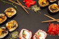 Sushi background. Sushi, chopsticks and ginger are laid out around the copy space. Royalty Free Stock Photo